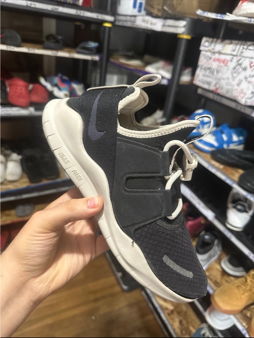 Nike Kids Black and Cream Slip-On Athletic Sneaker